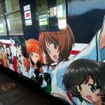 a train decorated with anime characters