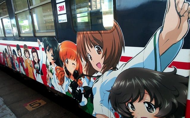 a train decorated with anime characters